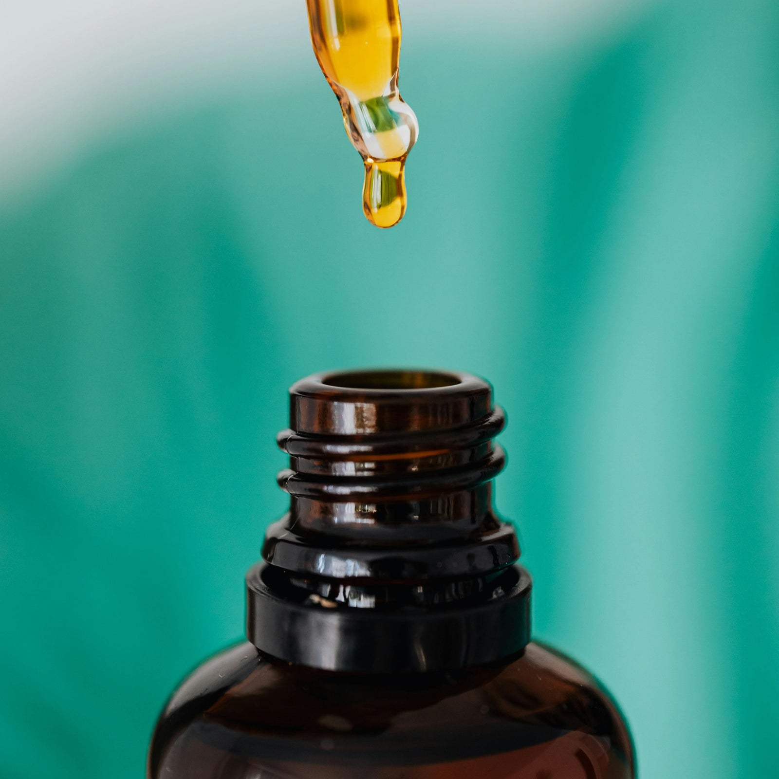 Dropper bottle with oil